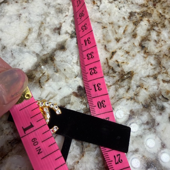 Vintage CHANEL Gold and Rhinestone Twist Lock Logo Earrings - Picture 5 of 5